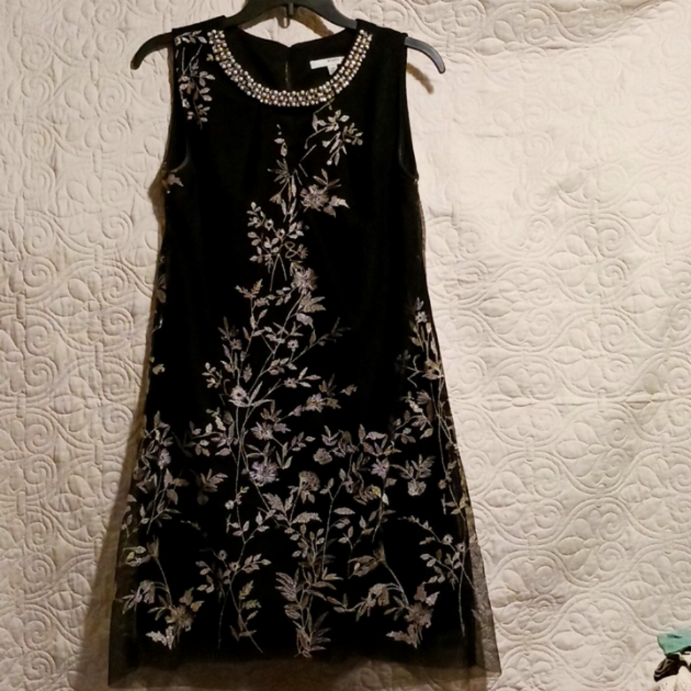 Pearl beads and crystal collar with black embroidered tulle overlay dress.